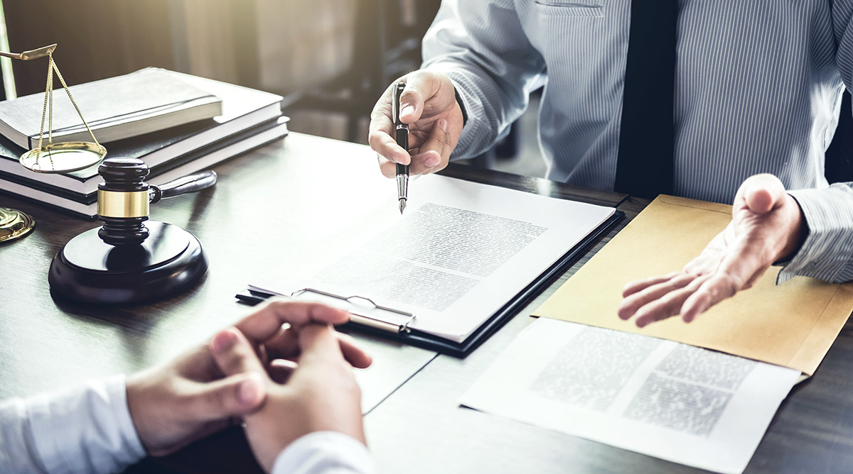 Businessman and lawyer consult having team meeting with client