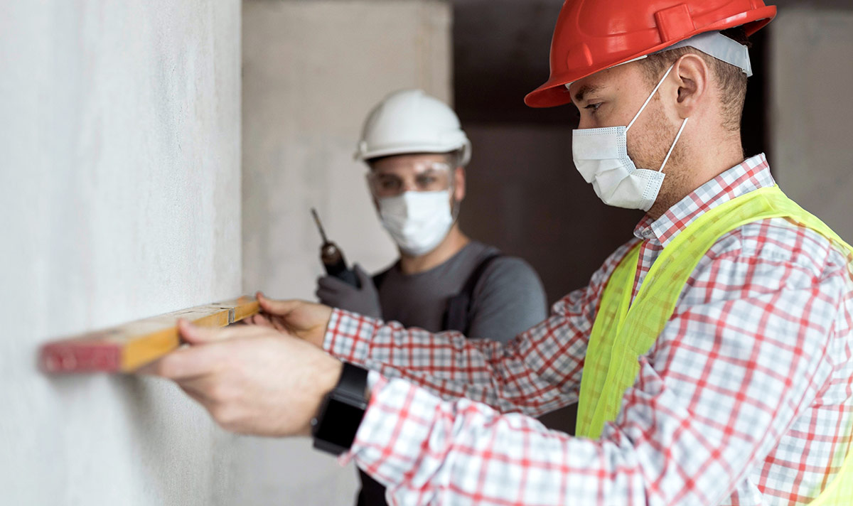 Side view men working with masks