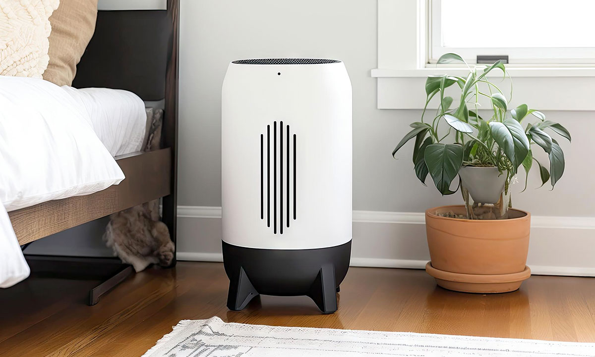 Air purifier in white room with black and silver accents 
