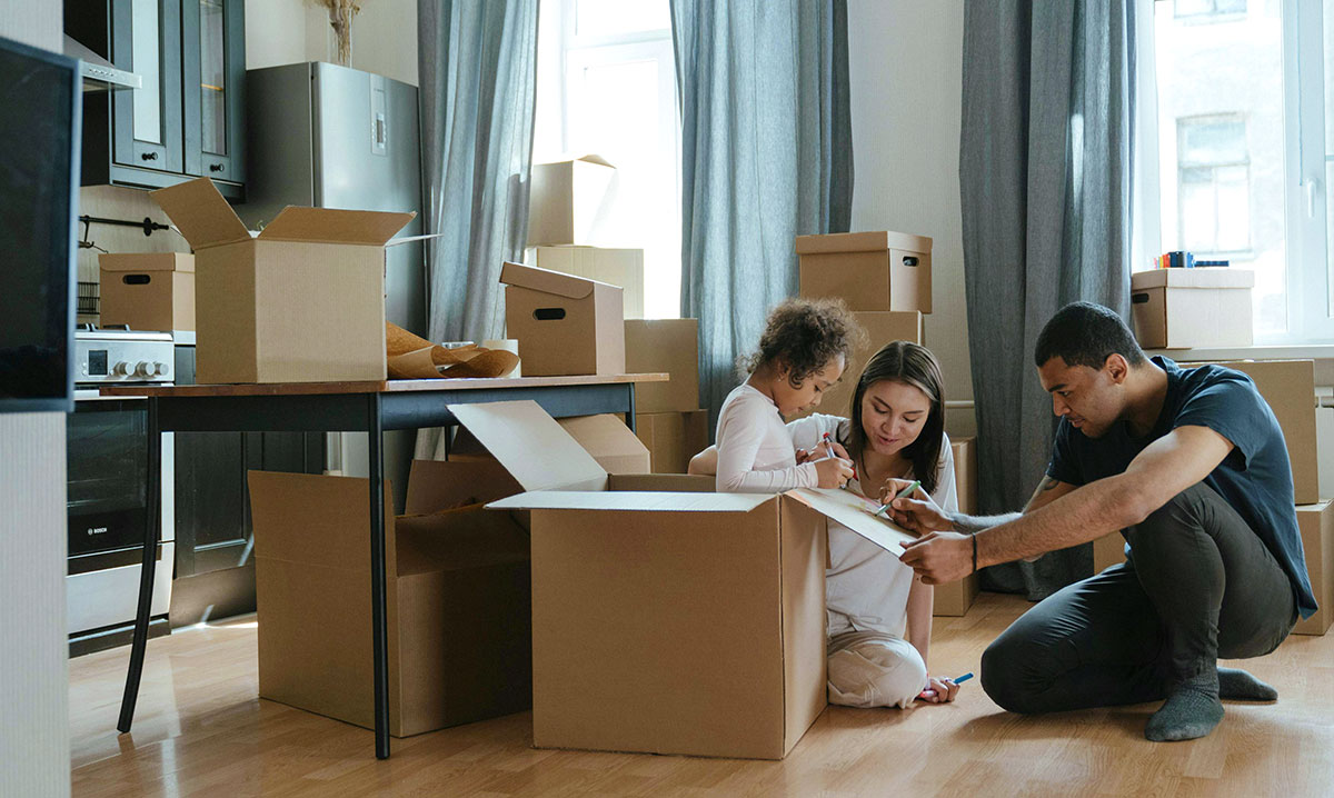 A family moving into their new home