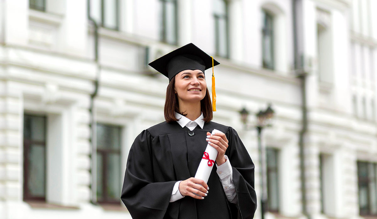 Smiley woman holding diploma