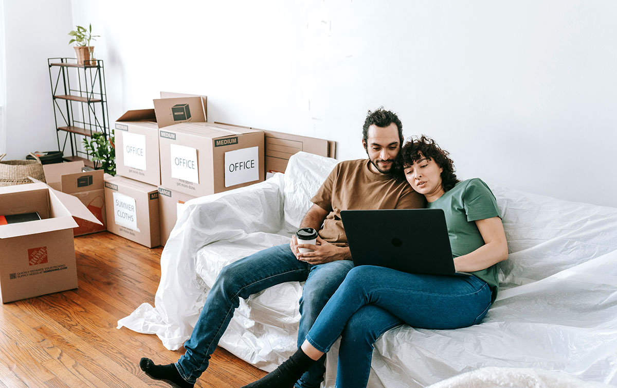 A couple moving into their new home