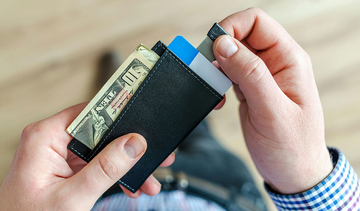Man holding a card holder