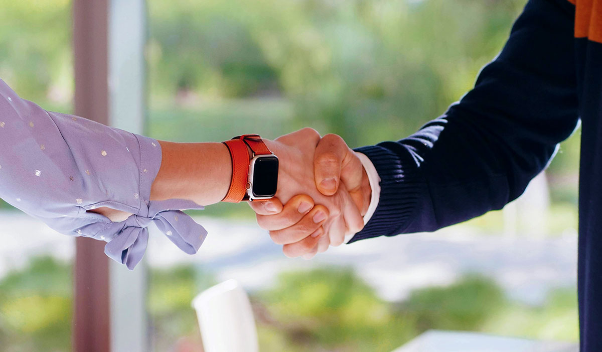 Two people shaking hands