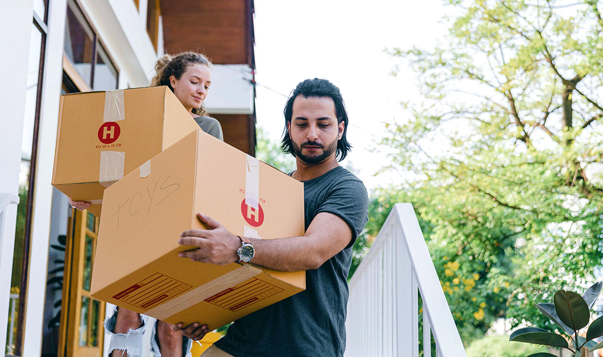 a couple moving into a new home